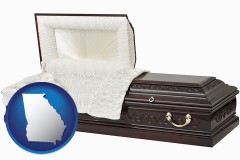 georgia map icon and an open funeral casket