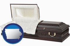iowa map icon and an open funeral casket