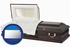 kansas map icon and an open funeral casket