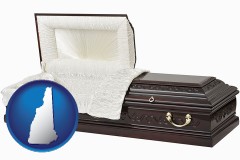 new-hampshire map icon and an open funeral casket