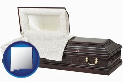 new-mexico map icon and an open funeral casket