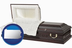 pennsylvania map icon and an open funeral casket