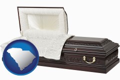 south-carolina map icon and an open funeral casket